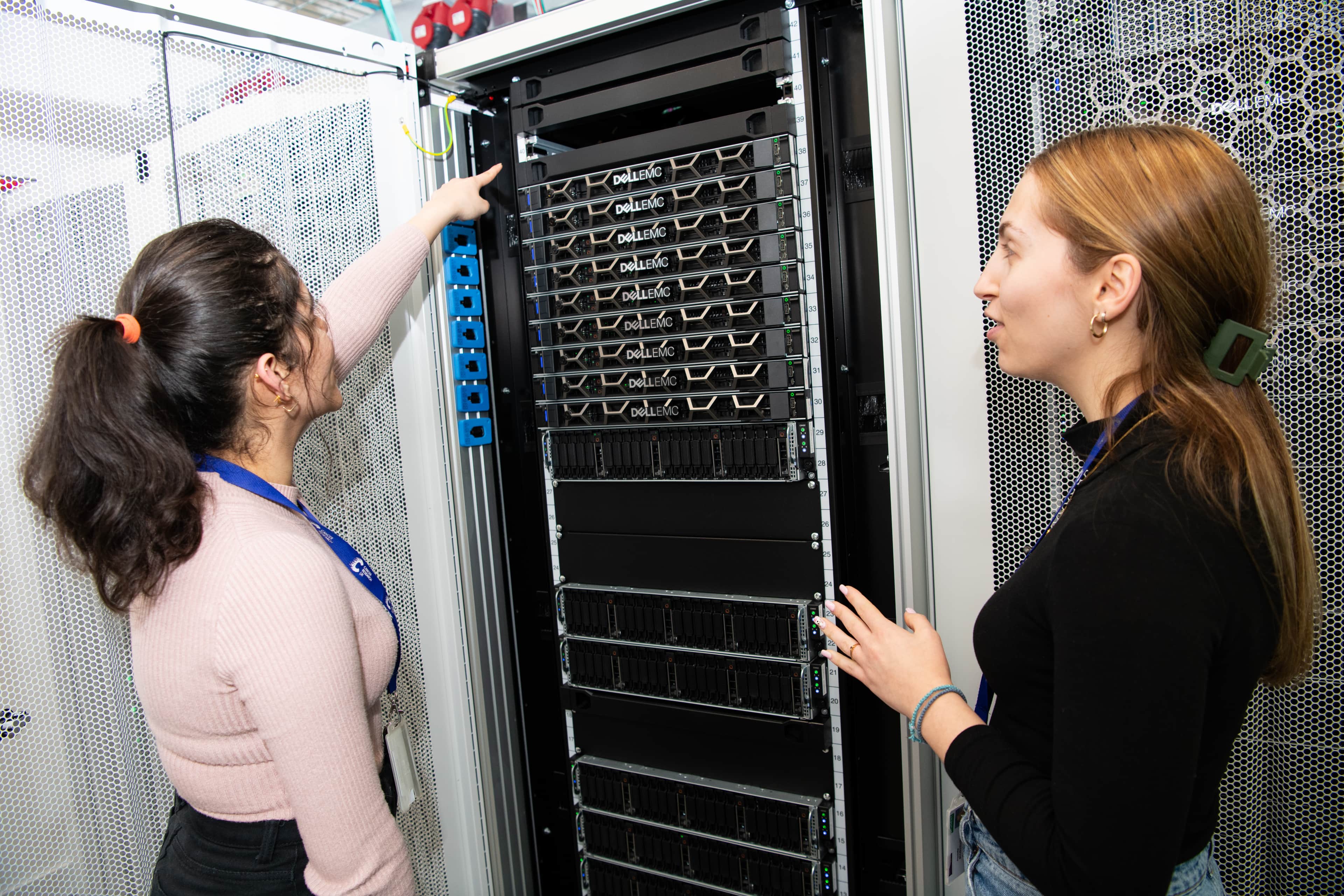 Two researchers engaged in discussion.