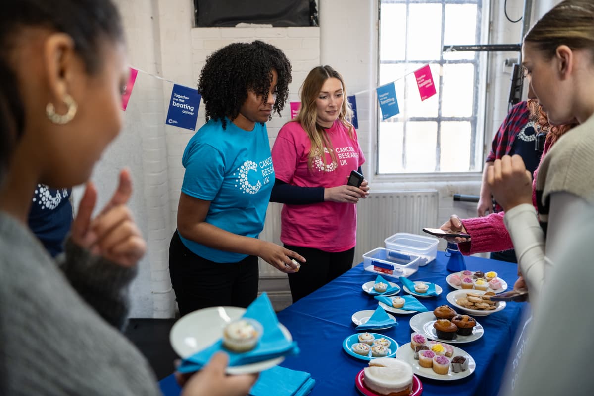 Cancer Research UK fundraisers at a bake sale.