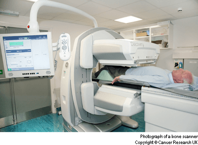 Photograph of a man having a bone scan.