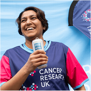 A photo of a person wearing a Cancer Research UK t-shirt.