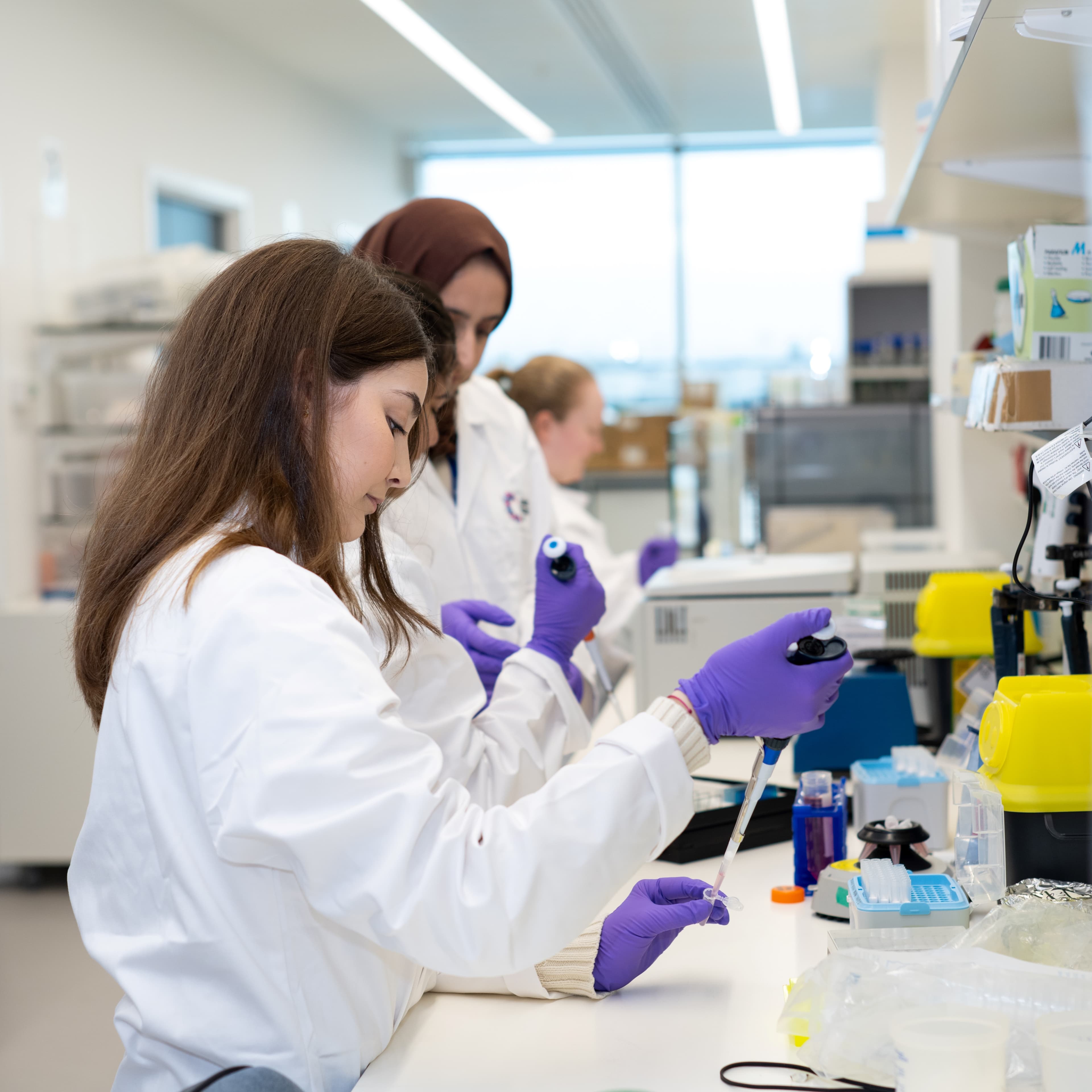 Two researchers working in a lab.