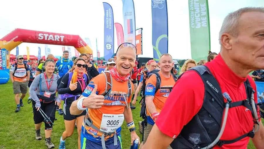 Man at start line with his thumbs up.