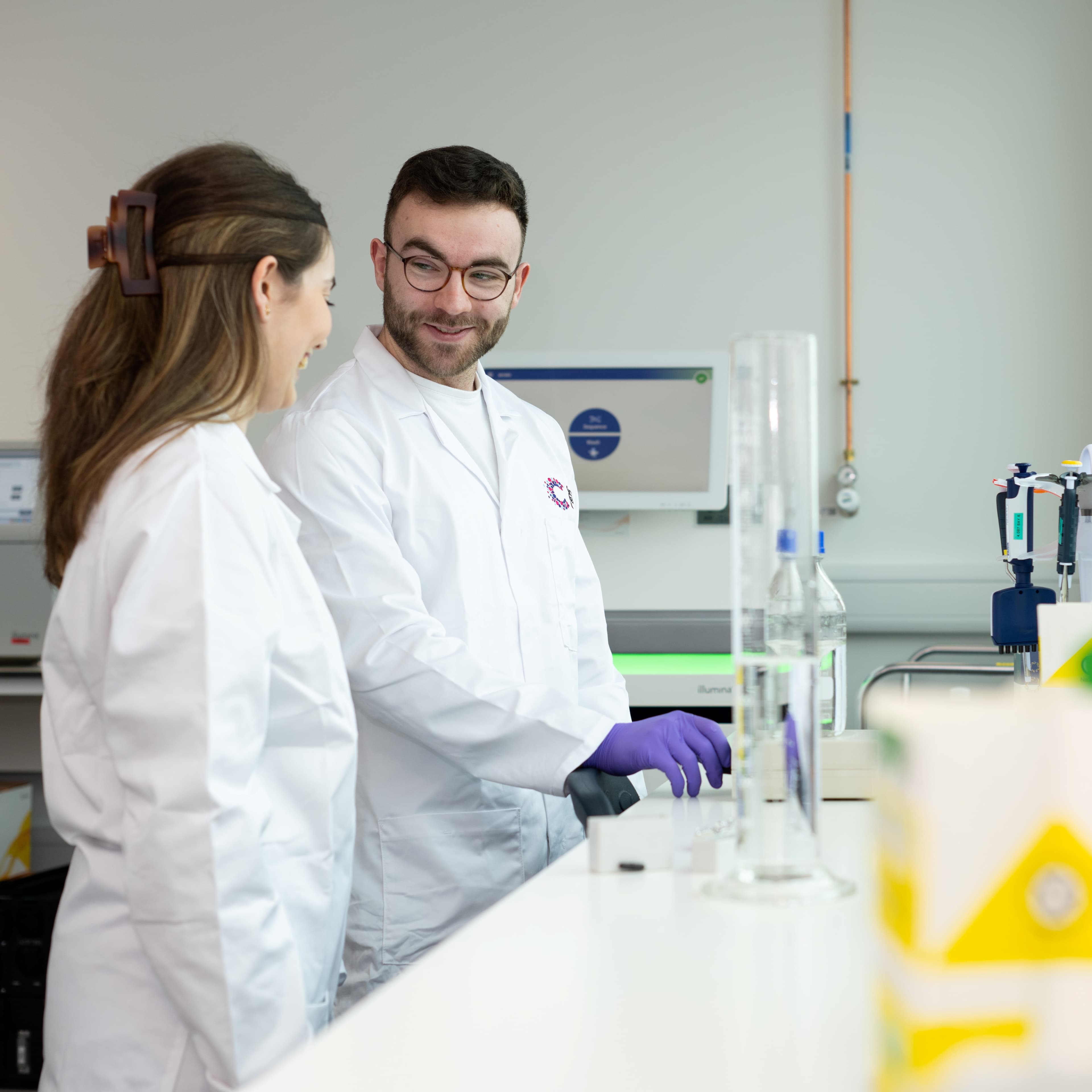 Two researchers working in a lab together.