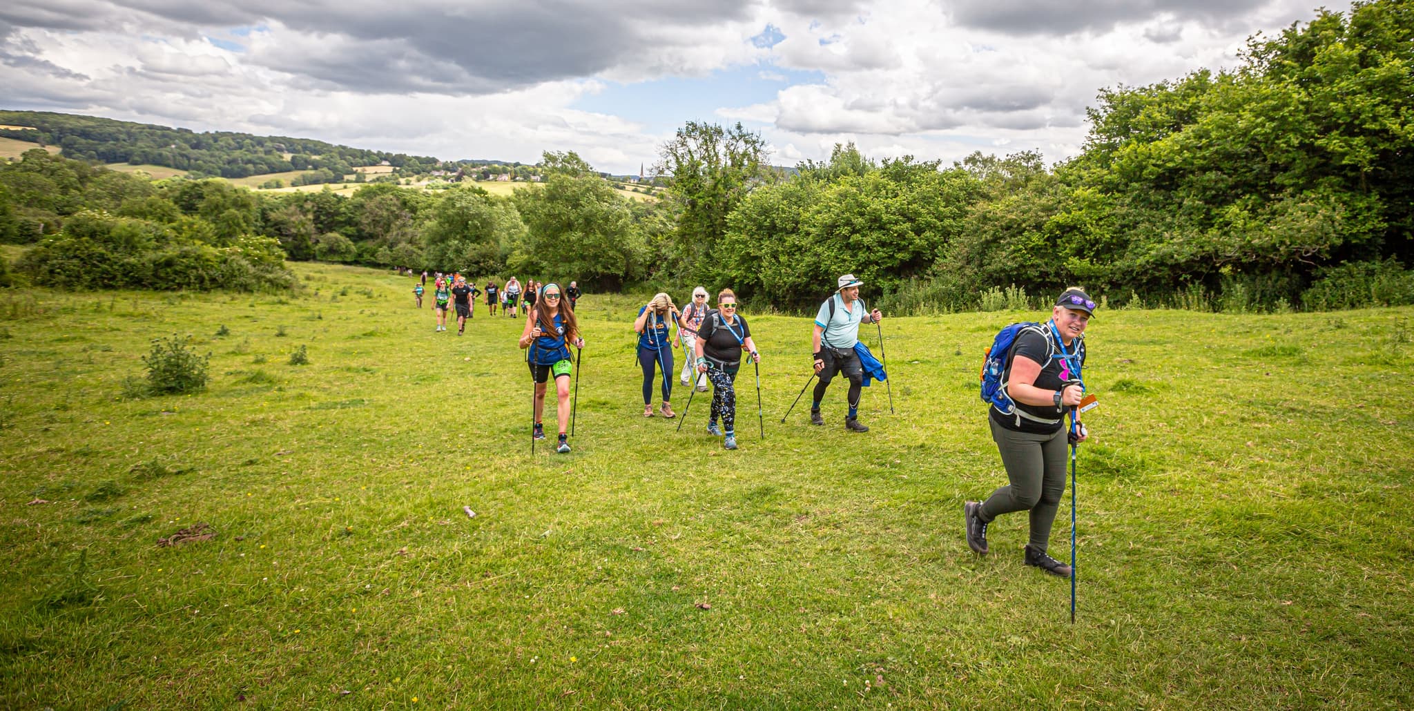 Participants walking in a field.